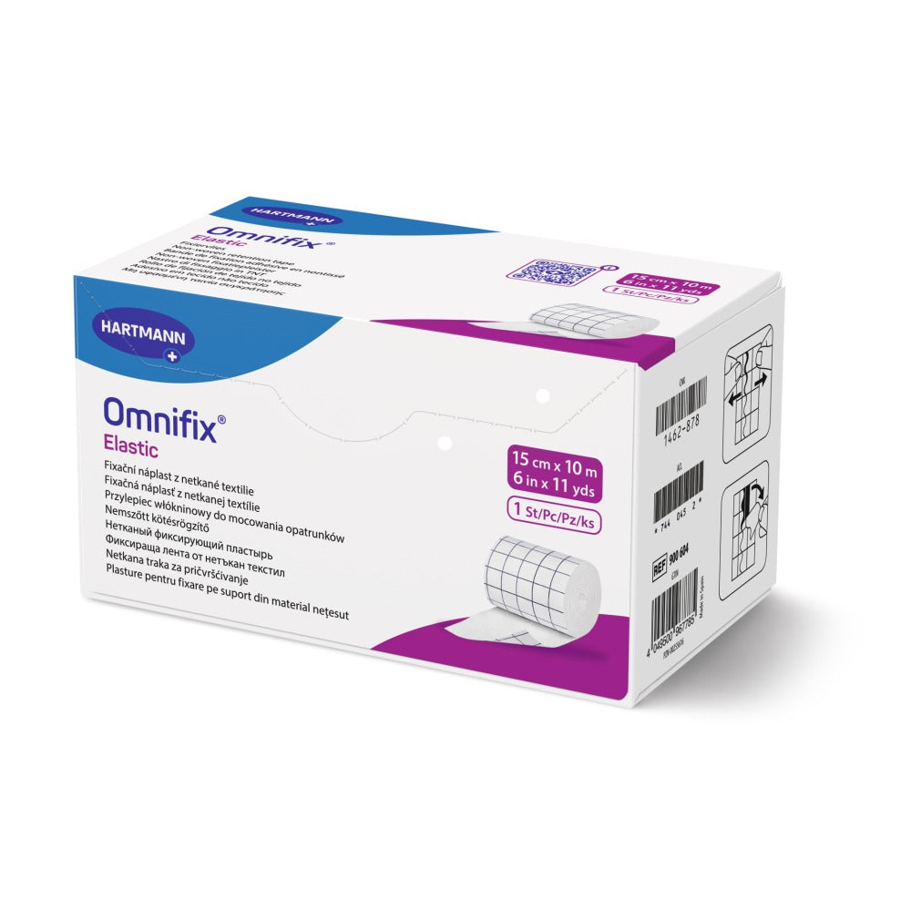 Das Bild zeigt ein Produkt mit der Bezeichnung „Hartmann Omnifixelastic“, einer elastischen Wundauflage. Die Rolle ist transparent und hat eine Breite von 15 cm und eine Länge von 10 m. Die Verpackung ist gut sichtbar, auf der Vorderseite sind Informationen zum Produkt abgedruckt, einschließlich des Markennamens „Hartmann“. Der Hintergrund ist hell und neutral gehalten, sodass die Rolle und die Druckinformationen klar erkennbar sind.