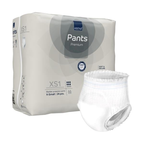 Das Bild zeigt eine Packung der Abena Pants Premium XS1, eine Art Inkontinenzhose. Die Verpackung ist klar und transparent, sodass der Inhalt sichtbar ist. Die Hose ist weiß und hat eine glatte Oberfläche, die eine hohe Saugfähigkeit und Komfort andeutet. Auf der Vorderseite der Packung sind das Produktlogo und wichtige Informationen zum Produkt wie Größe und Absorptionsstärke hervorgehoben. Der Hintergrund ist schlicht und einfarbig, um den Fokus auf die Packung zu lenken.