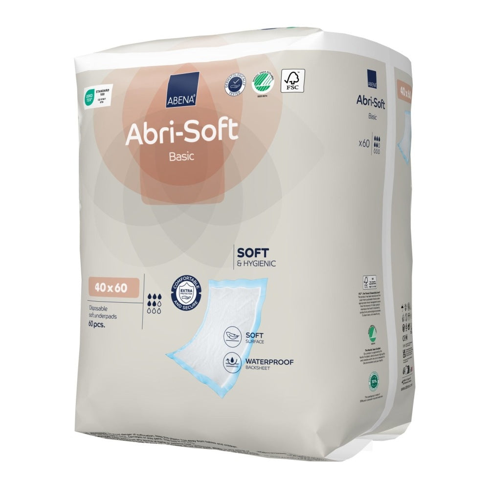 Ein Päckchen mit Einwegunterlagen, das in der Mitte des Bildes platziert ist. Die Unterlagen sind in der Farbe Weiß und in verschiedenen Größen erhältlich, wobei die Größe 40 x 60 cm hervorgehoben ist. Auf der Verpackung sind wichtige Informationen wie Anwendungshinweise und Produktdetails abgebildet. Der Hintergrund ist neutral gehalten, um die Unterlagen hervorzuheben. Die Verpackung ist sauber und professionell gestaltet, ideal für den Einsatz in Praxen oder bei öffentlichen Veranstaltungen.