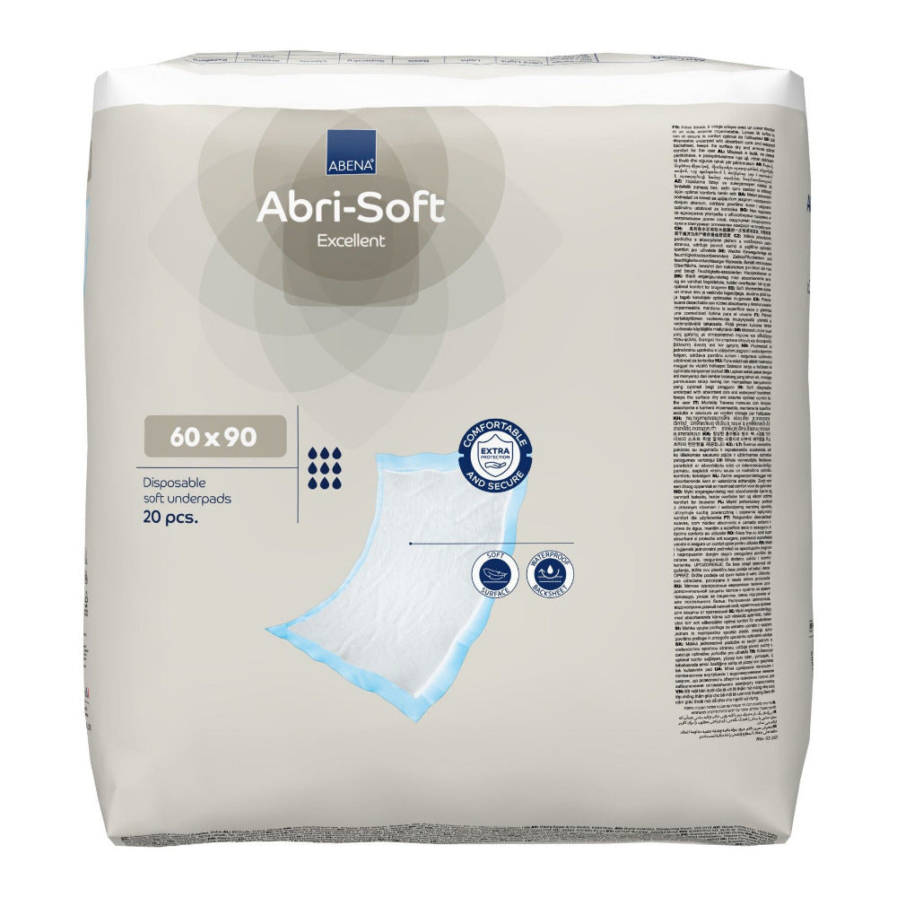 Das Bild zeigt eine Packung von Abri-Soft Excellen Unterlagen in der Größe 60 x 90 cm. Die Verpackung ist hauptsächlich in hellblau und weiß gehalten und zeigt auf der Vorderseite eine Abbildung der Unterlagen, die auf einer weichen Oberfläche liegen. Die Unterlagen sind als saugfähig und hautfreundlich gekennzeichnet, geeignet für die Verwendung bei der Pflege von Erwachsenen mit Inkontinenz. In der unteren rechten Ecke befindet sich ein Hinweis auf die Anzahl der enthaltenen Unterlagen.