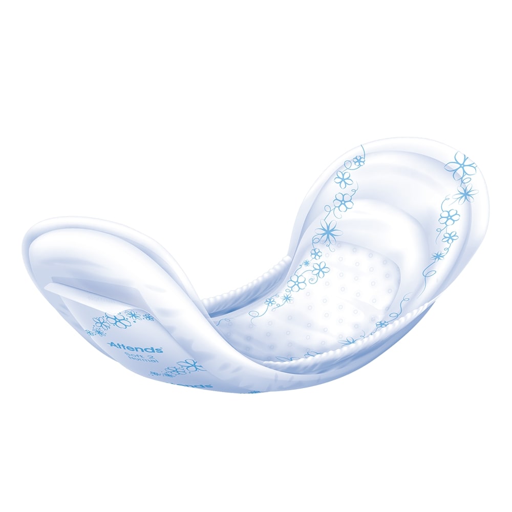 Weißes Produktbild einer Inkontinenzeinlage namens "Attends Soft 2 Normal". Die Einlage liegt flach auf einer neutralen, hellen Oberfläche. Sie hat eine weiche, textilähnliche Oberfläche und ist mit einem blauen Muster versehen. Die Form der Einlage ist anatomisch geformt, um Komfort und Sicherheit zu bieten. Im Hintergrund ist eine leichte Unschärfe zu erkennen, die den Fokus auf die Einlage lenkt.
