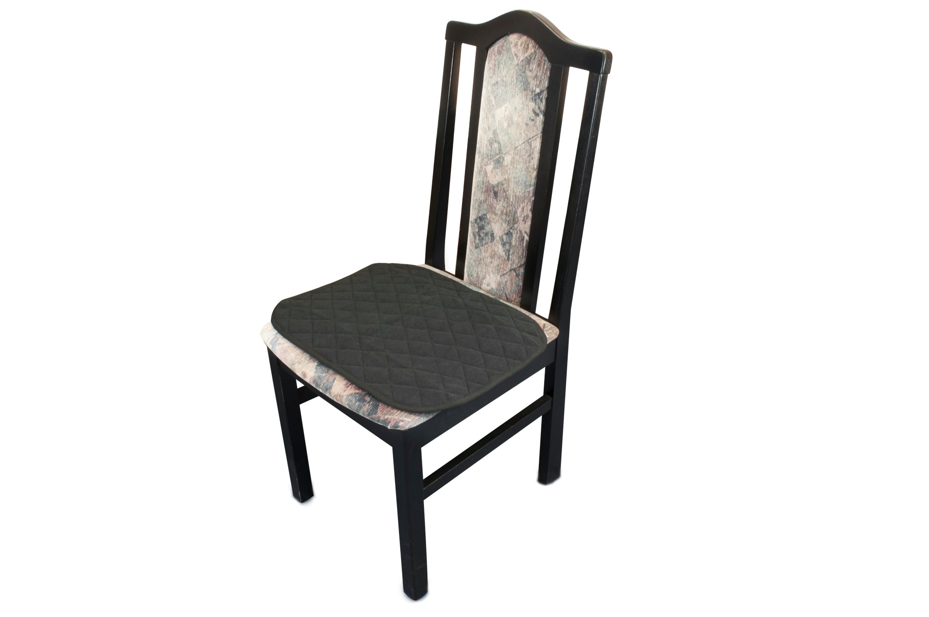 Ansicht einer Caretex Anti-Rutsch Inkontinenz-Sitzunterlage auf einem Stuhl.