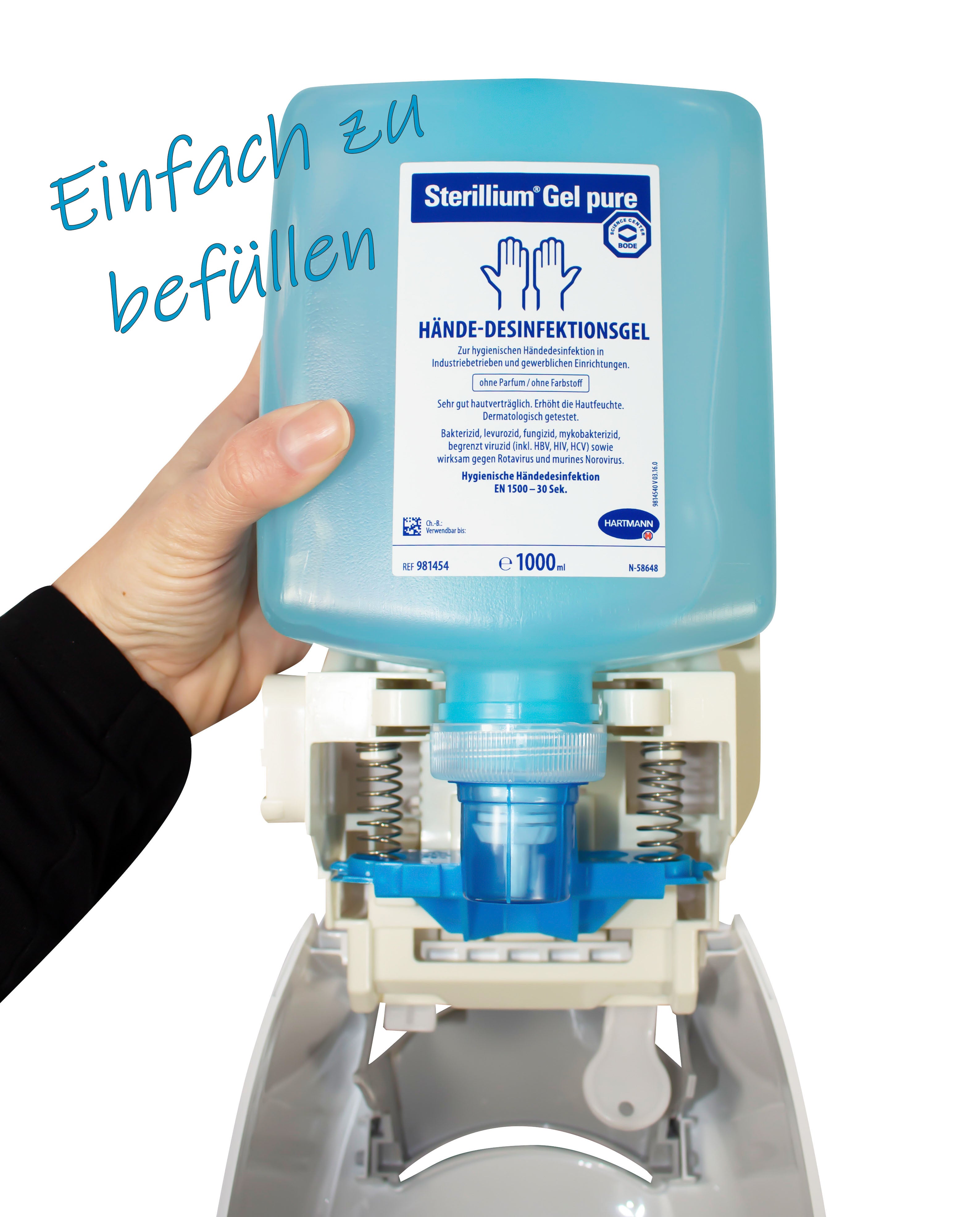 Das Bild zeigt einen Hartmann Cleansafe Basic Dosierspender für Überkopf-Flaschen. Der Spender hat ein schlichtes, funktionales Design in Weiß mit einer klaren, transparenten Front, die den Inhalt sichtbar macht. Die Montage erfolgt an der Wand, was Platz spart und eine einfache Handhabung ermöglicht. Der Spender ist für Desinfektionsmittel und Flüssigseifen konzipiert und bietet eine hygienische Dosierung. Oberhalb des Spenders sind Montageschrauben sichtbar, die einer stabilen Befestigung dienen.