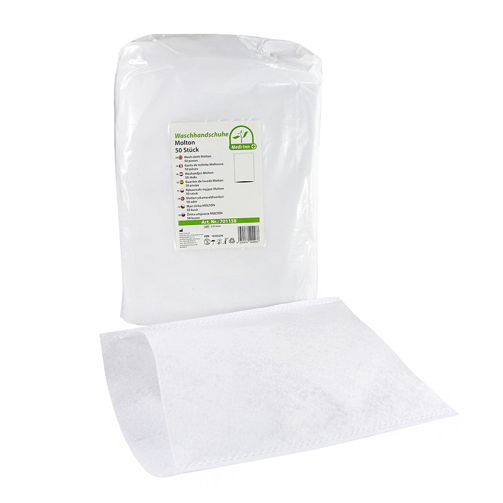 Ein Produktbild zeigt einen Pack mit 50 Einmal-Waschhandschuhen aus weichem Molton. Die Hände sind nicht abgebildet. Der Pack ist ordentlich gefaltet und zeigt eine Kombination aus blauen und weißen Farben. Die Waschhandschuhe sind rechteckig und messen 15 x 22 cm. Im Hintergrund ist ein heller, neutraler Untergrund, der den Fokus auf die Handschuhe lenkt. Das Bild vermittelt einen hygienischen Eindruck und eignet sich ideal für den Einsatz im Gesundheitswesen oder in der Pflege.