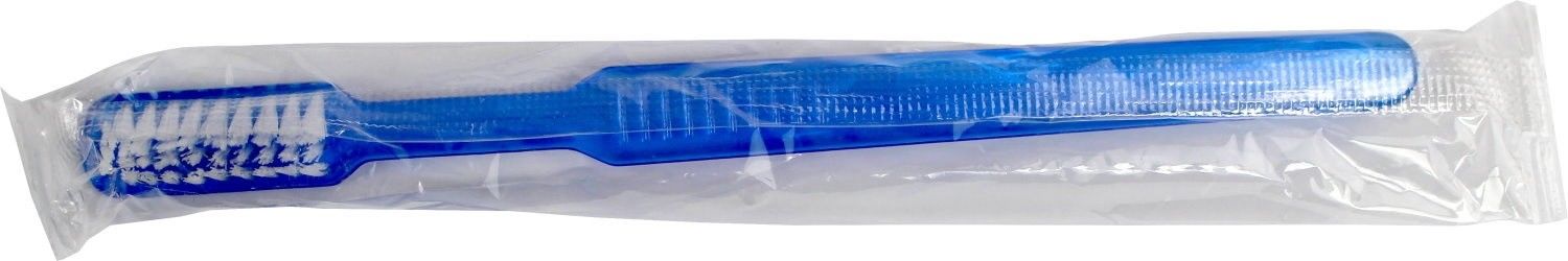 Ein Packungsbild zeigt eine einzelne, hygienisch verpackte Einwegzahnbürste in Blau. Die Zahnbürste hat einen ergonomischen Griff und weiche Borsten. Zusätzlich ist eine Portion Zahnpasta in der Verpackung enthalten, die in einer kleinen Tube abgefüllt ist. Der Hintergrund ist weiß, was die Produkte hervorhebt. Die Verpackung ist klar und zeigt sowohl die Zahnbürste als auch die Zahnpasta deutlich.