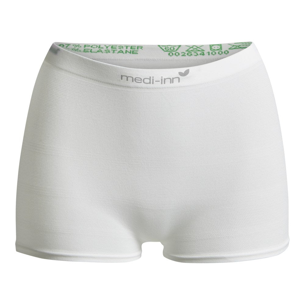 Bild eines Produktes: Medi Inn Fix Soft Fixierhosen in Größe XL. Die Hose ist aus weichem, elastischem Material gefertigt und zeigt eine hellgraue Farbe. Sie hat einen breiten, elastischen Bund für einen bequemen Sitz und an den Beinen umschließt sie sanft die Haut. Das Material ist atmungsaktiv und angenehm auf der Haut, ideal für den Einsatz im Pflegebereich. Die Hose verfügt über seitliche Nähte und zeigt eine praktische, körpernahe Passform.