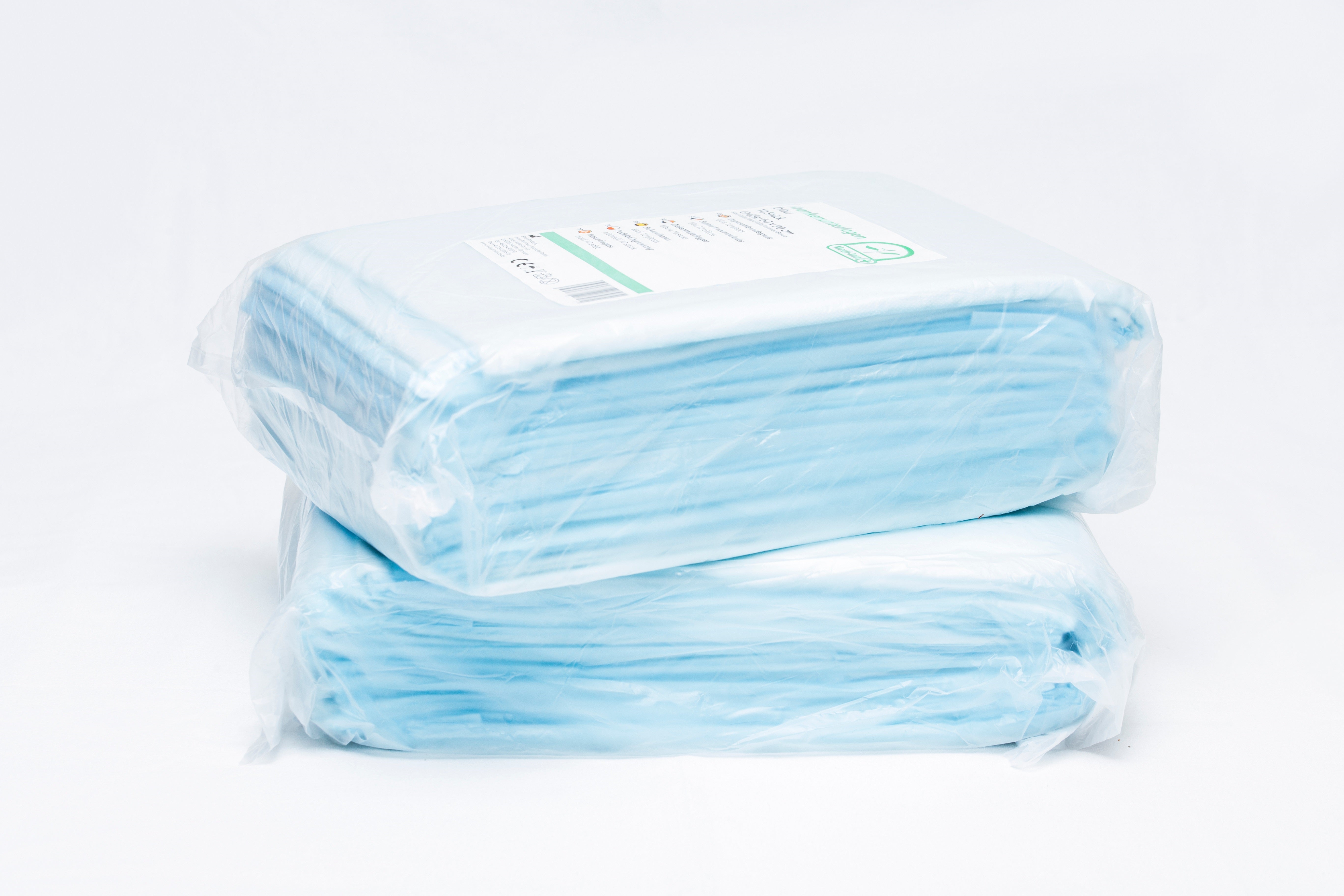 Ein 10er-Pack von Medi Inn Krankenunterlagen, die jeweils eine Größe von 60 x 90 cm haben und aus 10 Lagen bestehen. Die Unterlagen sind in einem klaren, ansprechenden Design abgebildet und liegen zusammen auf einer weißen Fläche. Die Verpackung zeigt die Produktbezeichnung und wichtige Informationen zum Artikel. Die Unterlagen sind als Einmalprodukte konzipiert, um Hygiene und Sicherheit in medizinischen und pflegerischen Umgebungen zu gewährleisten.