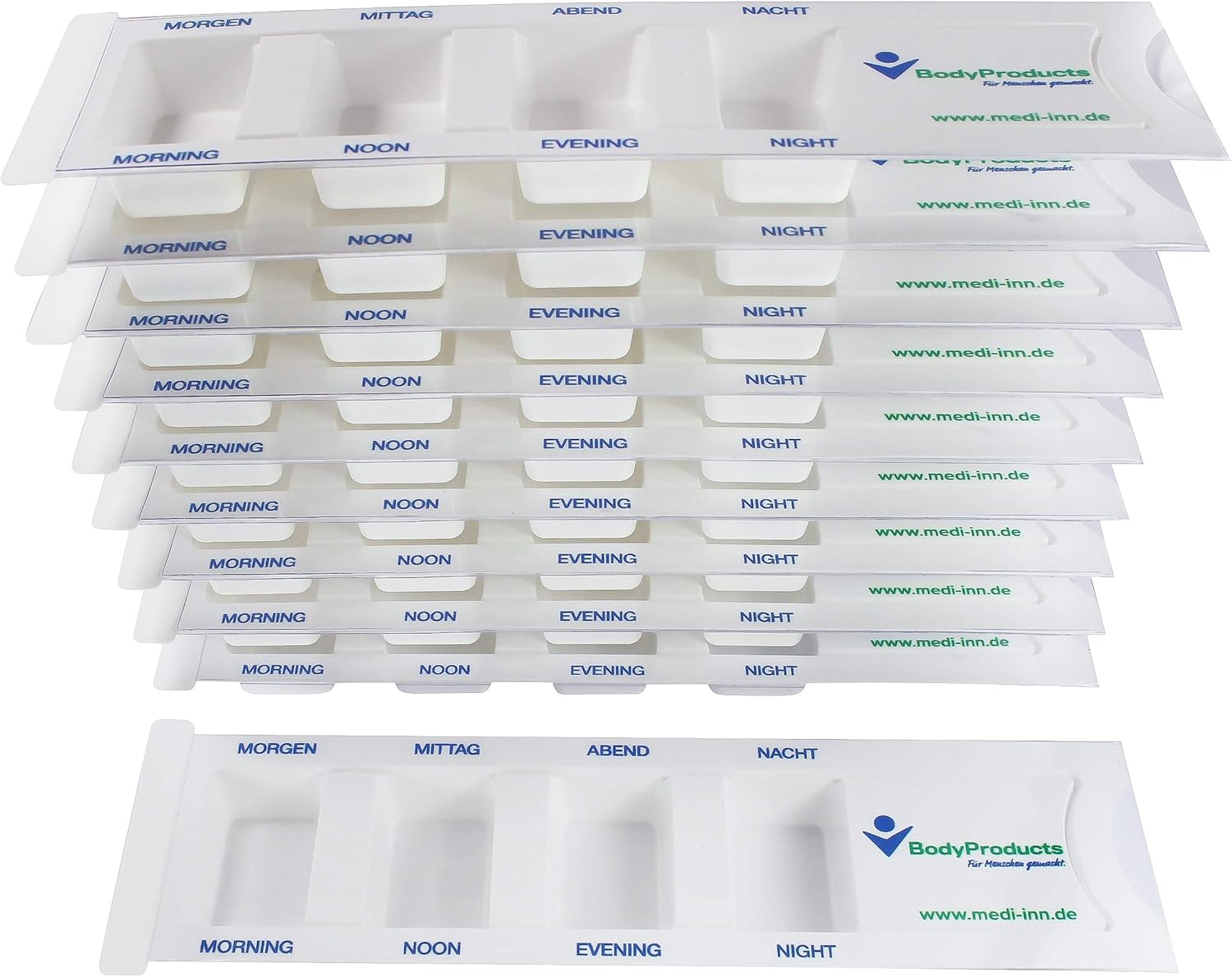 Bild eines Medikamentendispensers mit vier Fächern, die jeweils eine andere Tageszeit repräsentieren: Morgen, Mittag, Abend und Nacht. Der Dispenser ist in einem klaren, transparenten Design gehalten, wodurch die darin enthaltenen Tabletten gut sichtbar sind. Jede Fächerabdeckung ist farblich markiert, um die Erkennung zu erleichtern. Der Dispenser ist auf einem weißen Hintergrund platziert, wodurch er hervorsticht. Ideal zur täglichen Organisation von Medikamenten und Nahrungsergänzungsmitteln.