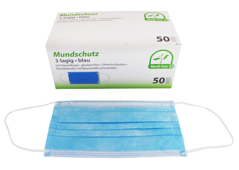 Ein medizinischer Mundschutz in Blau, der aus drei Lagen besteht und mit elastischen Bändern ausgestattet ist. Der Mundschutz zeigt eine glatte, strukturierte Oberfläche und hat an den Seiten die elastischen Bänder gut sichtbar, die einen sicheren Sitz hinter den Ohren gewährleisten. Das Design ist einfach und funktional, geeignet für den einmaligen Gebrauch. Der Atemschutz ist für den Schutz im medizinischen Umfeld konzipiert und bietet effektiven Schutz gegen Partikel und Keime.