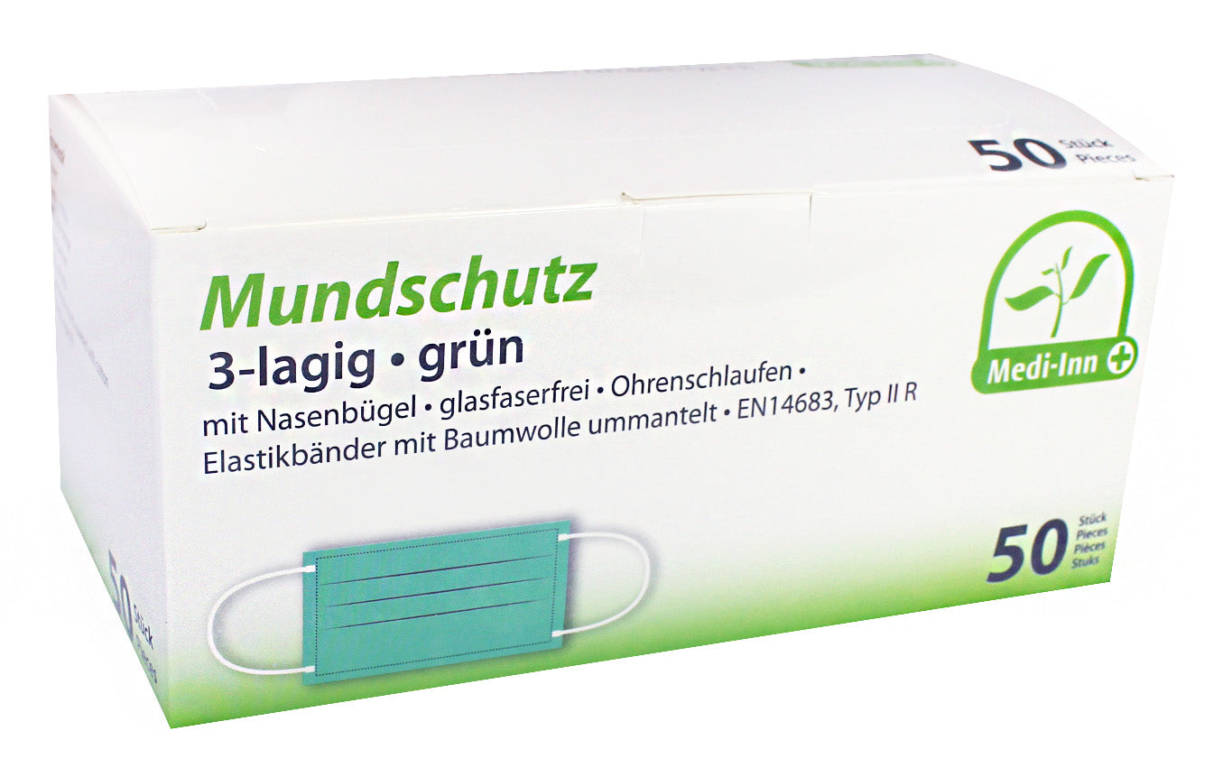 Mundschutz Atemschutz Typ IIR in Grün, dreilagig. Der Masken besitzt einen praktischen Nasenbügel, der eine optimale Anpassung an das Gesicht ermöglicht, sowie elastische Bänder für einen komfortablen Sitz hinter den Ohren. Die Oberseite der Maske zeigt eine glatte, leicht glänzende Oberfläche, während die Unterseite mattschwarz ist. Die Masken sind in einem Stapel angeordnet und teilweise übereinandergelegt, um die Struktur und die Schichten deutlich sichtbar zu machen.