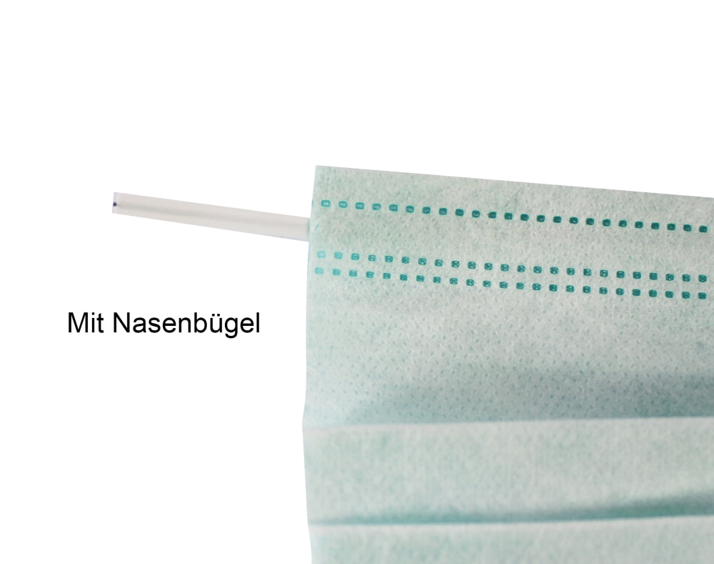 Das Bild zeigt einen Mundschutz zum Binden vom Typ IIR, der dreilagig ist. Der Schutz hat eine hellblaue Farbe und ist mit flexiblen Bindebändern ausgestattet, die zur Anpassung hinter den Ohren oder am Kopf verwendet werden können. Die Maske hat eine strukturierte Oberfläche und ist so gestaltet, dass sie sowohl Schutz als auch Komfort bietet. Im Hintergrund ist eine neutrale, unscharfe Oberfläche zu sehen, die den Fokus auf den Mundschutz lenkt.