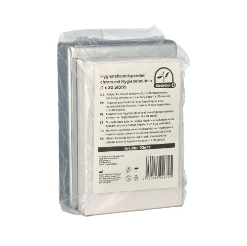 Hygienebeutelspender aus glänzendem Chrom mit einem schlanken, modernen Design, der an der Wand montiert ist. Der Spender ist mit einer Abdeckung ausgestattet, die leicht zu öffnen ist, um die hygienischen Beutel einfach nachzufüllen. Neben dem Spender liegen insgesamt 30 transparente Hygienebeutel in einer offenen Verpackung, die eine hygienische Entsorgung ermöglichen. Der gesamte Farbton ist silber und reflektiert Licht, was dem Produkt eine elegante Note verleiht.