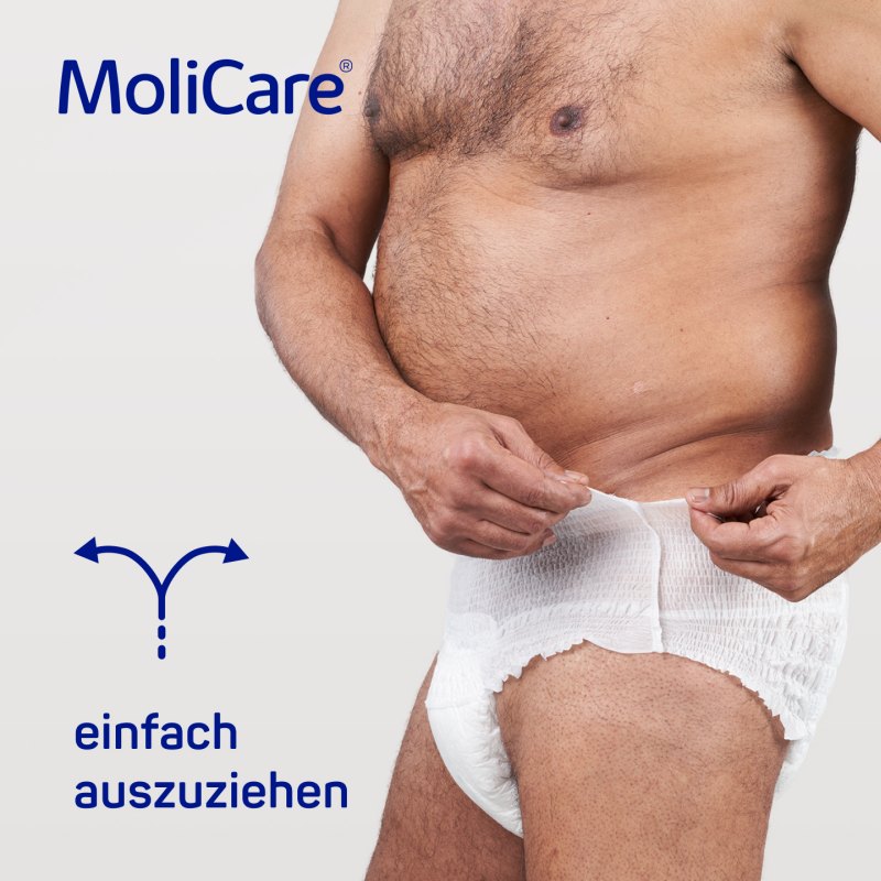 Das Bild zeigt eine Packung von Molicare Premium Mobile Einlagen in der Größe M. Die Verpackung ist größtenteils in Weiß gehalten und zeigt das blaue Molicare-Logo deutlich. An der Vorderseite sind die Produktbezeichnung „Premium Mobile 10 Tropfen“ sowie die Größenangabe „M“ gut sichtbar. Die Verpackung ist oben offen und zeigt, dass sie 10 Einlagen enthält. Im Hintergrund ist ein neutraler, heller Farbton, der die Produktdetails hervorhebt.
