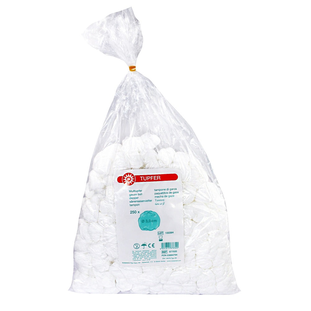 Runde, weiße Mulltupfer in einer transparenten Verpackung, ordentlich gestapelt und aufgereiht. Die Verpackung zeigt die Produktbezeichnung "Noba Mulltupfer" sowie die Anzahl der enthaltenen Stücke, insgesamt 250. Der Hintergrund ist neutral gehalten, um die Aufmerksamkeit auf die Tupfer zu lenken. Die Mulltupfer sind weich und saugfähig, ideal für medizinische Anwendungen oder zur Hautpflege.