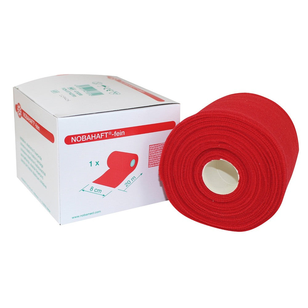 Weißer elastischer Fixierverband, auch bekannt als Noba-Nobahaft, auf einem hellen Hintergrund. Die Verpackung zeigt die Produktbezeichnung in klarer Schrift, ergänzt durch Angaben zur Größe von 6 cm x 20 m. Der Verband ist aus einem leichten, atmungsaktiven Material gefertigt, das eine gute Haftung bietet, ohne zu kleben. Die Rolle ist aufrecht positioniert und vermittelt die Flexibilität und Anwendbarkeit des Produkts.