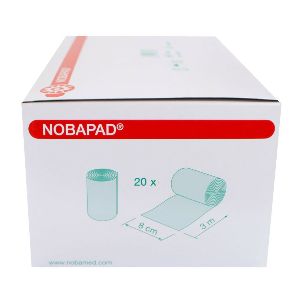 Bild zeigt eine Verpackung mit 20 Rollen Noba Nobapad Polsterbinden aus synthetischer Watte. Die Rollen sind gleichmäßig gestapelt und in einer transparenten Kunststoffverpackung untergebracht, die das Produkt schützt und die Verwendung erleichtert. Auf der Verpackung sind Informationen über das Produkt, wie Anwendung und Materialzusammensetzung, klar abgedruckt. Der Hintergrund ist neutral, um die Binden hervorzuheben.