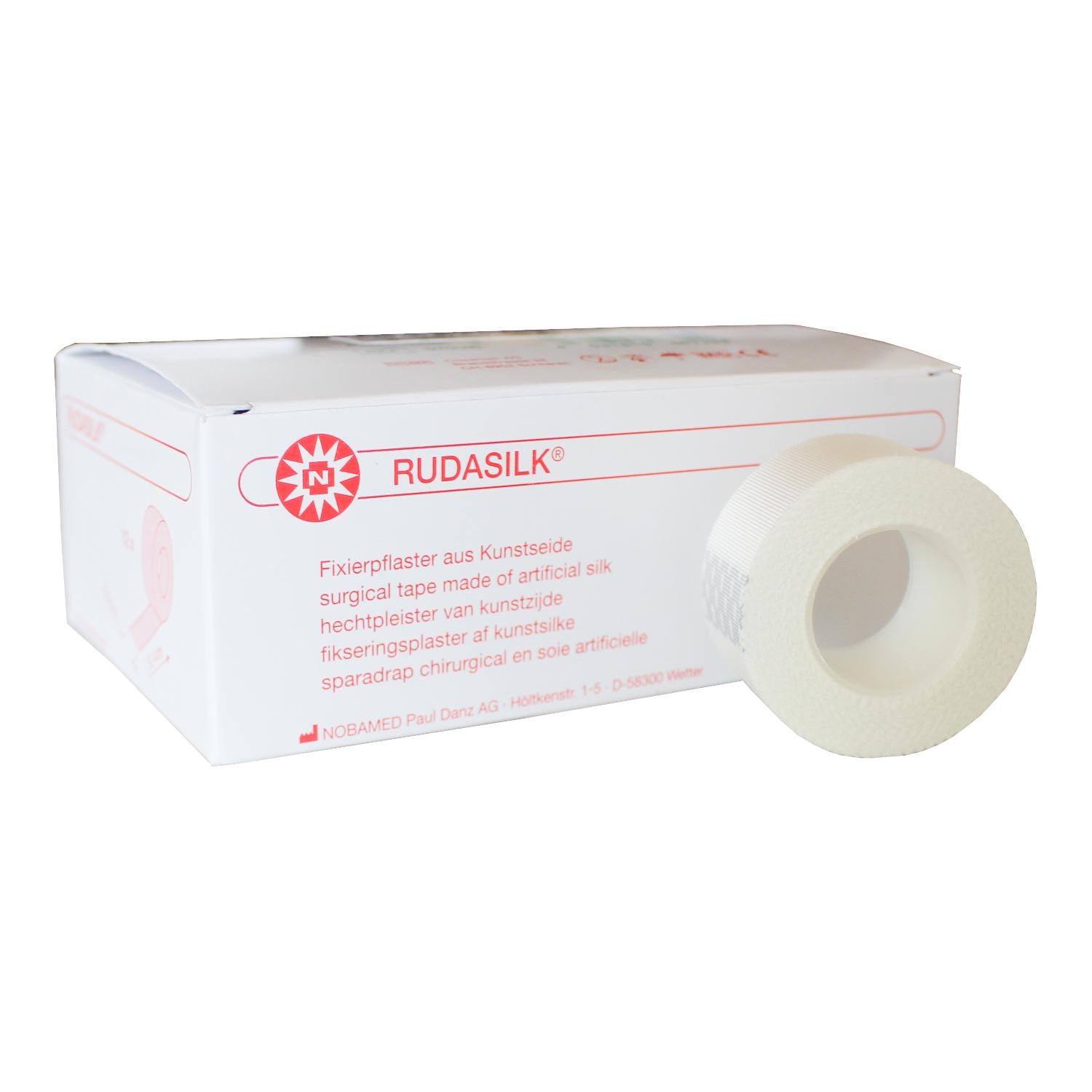 Bildbeschreibung eines Produkts: Noba Rudasilk Fixierpflaster ohne Seitenscheiben, Größe 125 cm x 914 m. Das Pflaster ist auf einer Rolle abgebildet und zeigt eine blickdichte, hautfreundliche Oberfläche in einem sanften, hellen Farbton. Die Rolle ist klar strukturiert und gut beleuchtet, während der Hintergrund neutral und unauffällig gehalten ist. Das Produkt bietet vielseitige Anwendungsmöglichkeiten in der Wundversorgung und ist praktisch verpackt, um die Handhabung zu erleichtern.