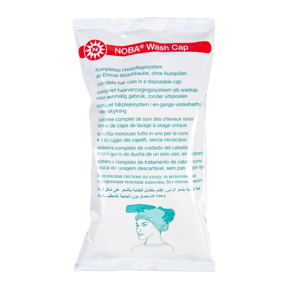 Bild eines Noba Waschhaube-Produkts: Die Verpackung zeigt eine elegante, minimalistische Gestaltung in sanften Farbtönen. Der Fokus liegt auf der Waschhaube, die für die Haarpflege konzipiert ist und ohne Ausspülen verwendet werden kann. Die Anwendung verspricht eine einfache Handhabung und effektive Pflege für das Haar. Auf der Verpackung sind Anweisungen und Schlüsselvorteile abgebildet.