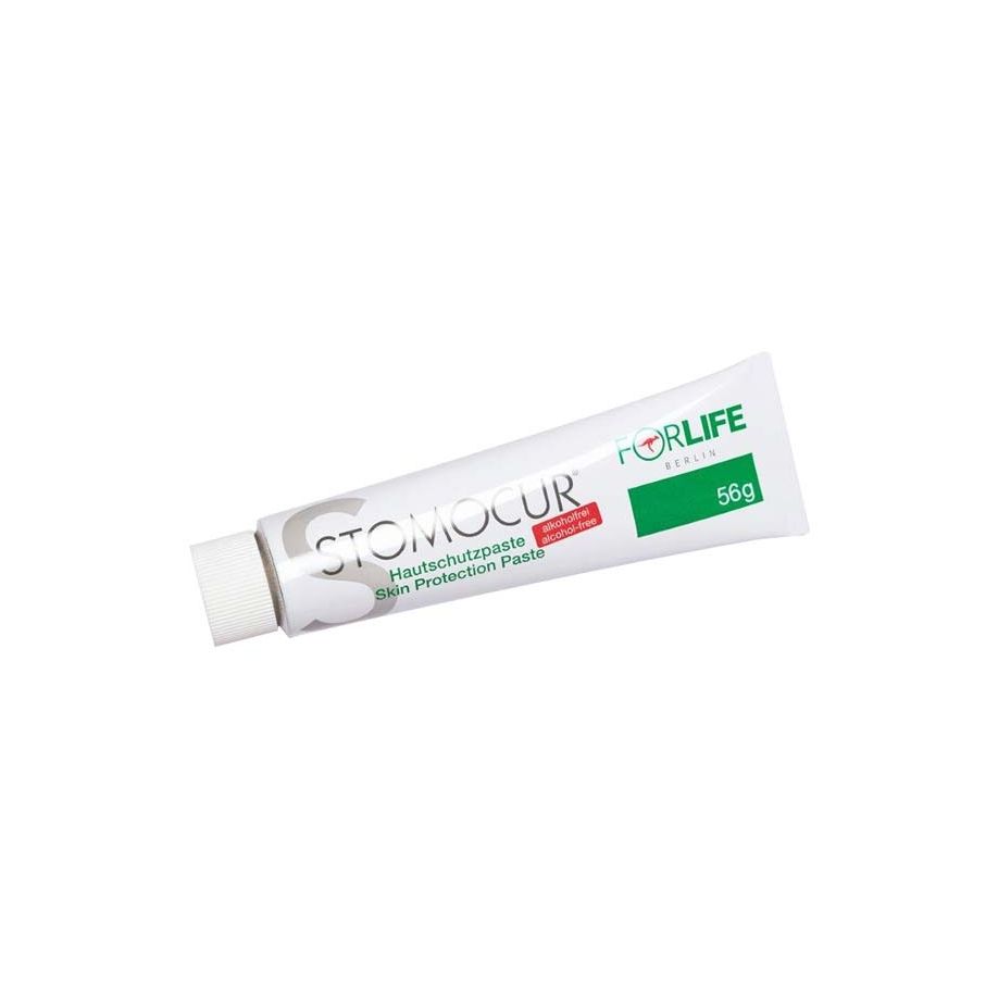 Kleine Tube mit Stomocur Hautschutzpaste, platzsparend und handlich, auf einem neutralen Hintergrund. Die Tube hat eine weiße Verpackung mit blauen und grünen Akzenten. Auf der Vorderseite sind der Produktname "Stomocur Hautschutzpaste" sowie die Hinweise "hautfreundlich" und "alkoholfrei" deutlich sichtbar. Die Tube zeigt einen praktischen Deckel, und der Inhalt lässt sich einfach dosieren.