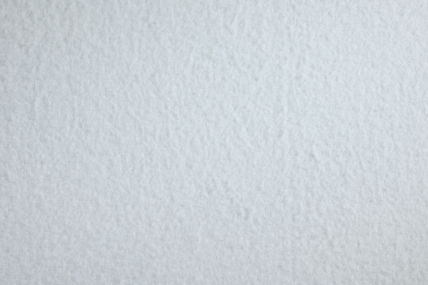 Premium Molton Bettauflage in der Größe 100x200 cm, gefertigt aus weichem, atmungsaktivem Material. Die Auflage zeigt eine strukturierte Oberfläche für zusätzlichen Komfort und Schutz. Sie ist in einem neutralen, hellen Farbton gehalten, der sich leicht in verschiedene Schlafzimmereinrichtungen einfügt. Eingenähte elastische Spannungen an den Ecken gewährleisten einen sicheren Halt auf der Matratze.