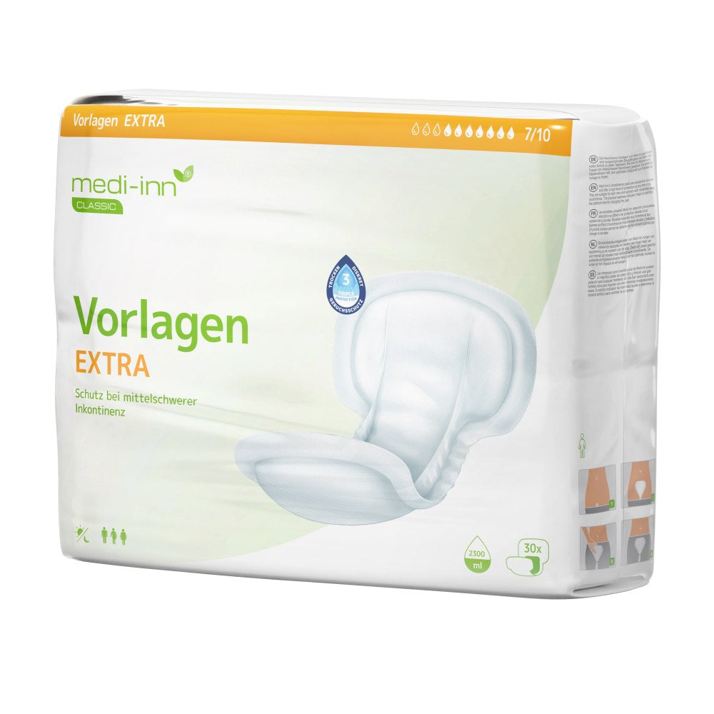Verpackung der "medi-inn Classic Vorlagen EXTRA", Inkontinenzvorlagen für mittelschwere Inkontinenz. Die Verpackung ist weiß mit grünen und orangenen Elementen. Abgebildet ist eine Vorlage, daneben Symbole und Informationen zur Saugfähigkeit (2300 ml) und Stückzahl (30 Stück).